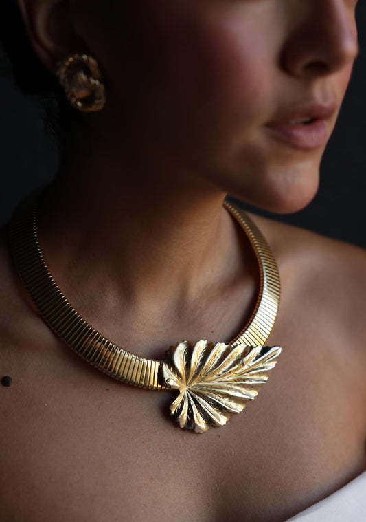 Gold-Tone Omega Collar Necklace with Sculpted Leaf Accent
