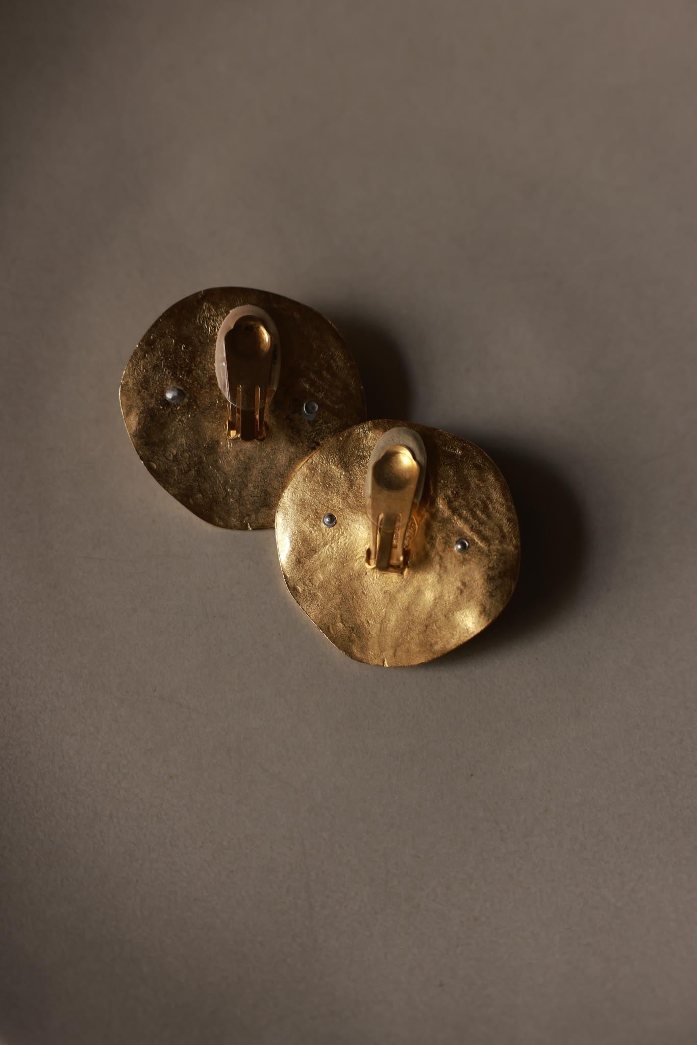 1980s Unsigned Les Bernard Gold Tone Sculptural Clip-On Earrings with Black Centers
