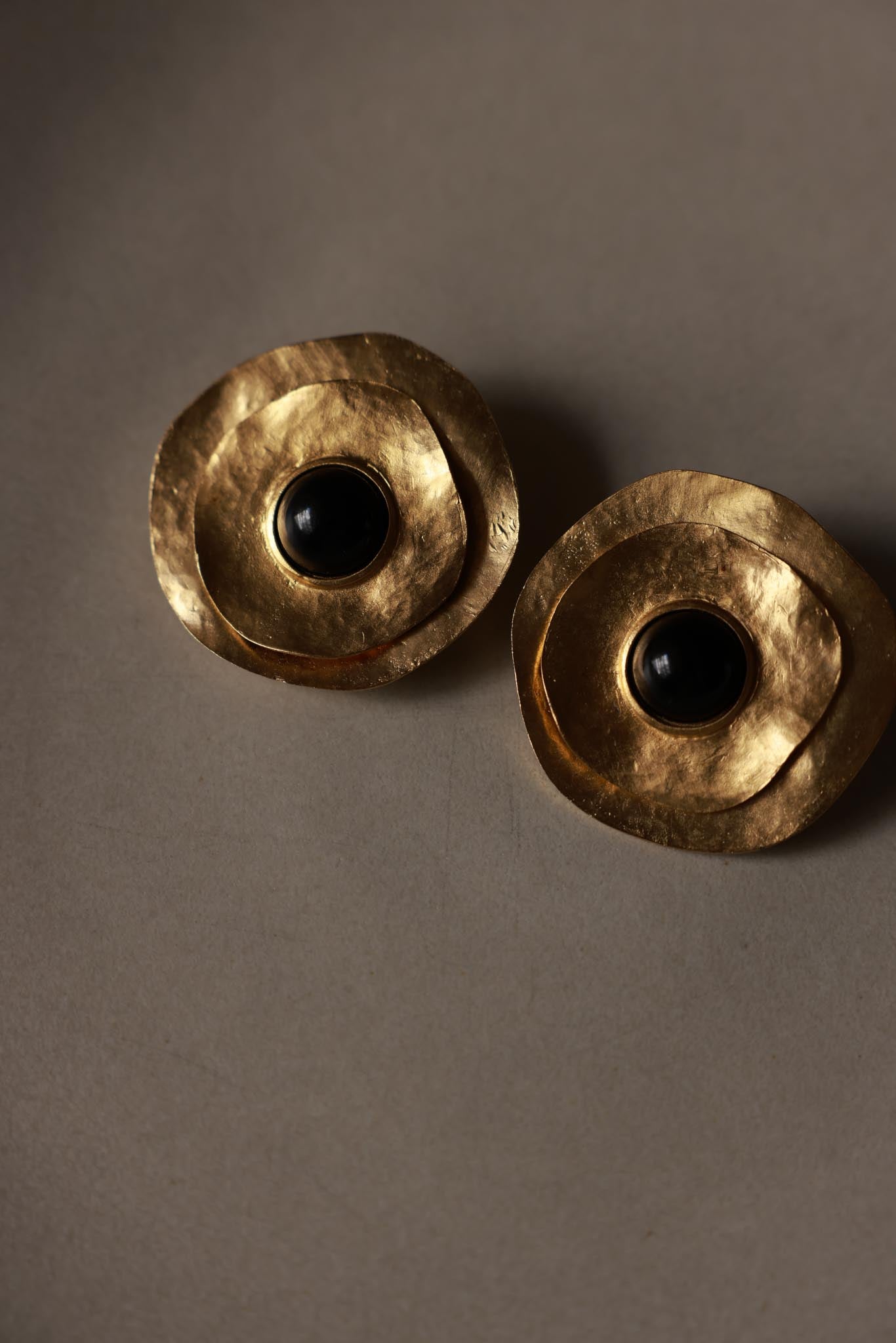 1980s Unsigned Les Bernard Gold Tone Sculptural Clip-On Earrings with Black Centers