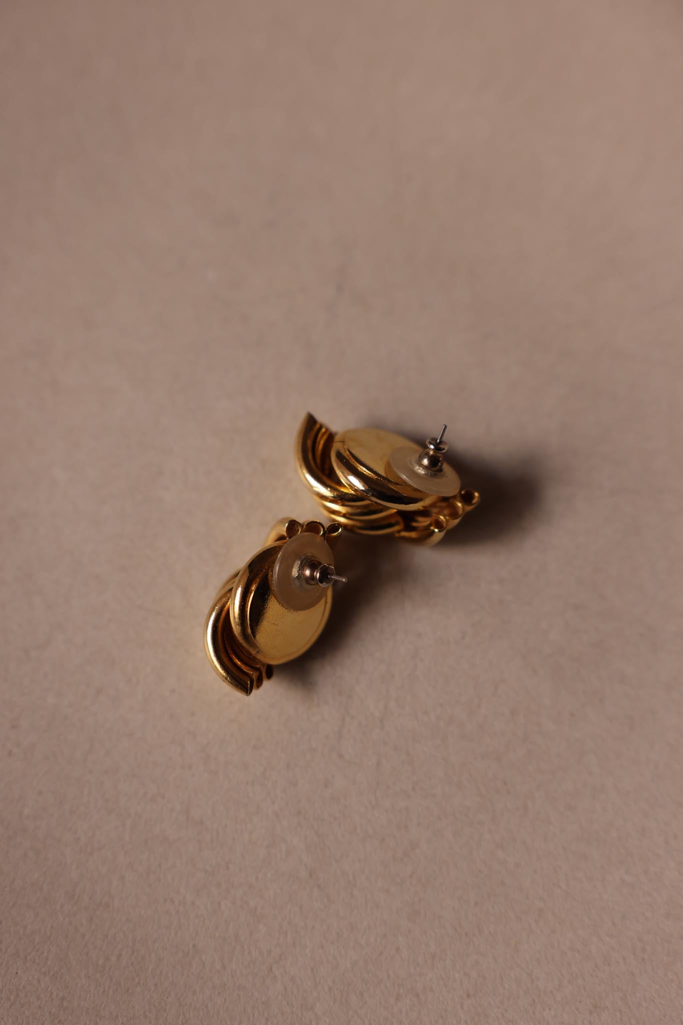 Twisted Gold Knot Earrings with Rhinestone Detail