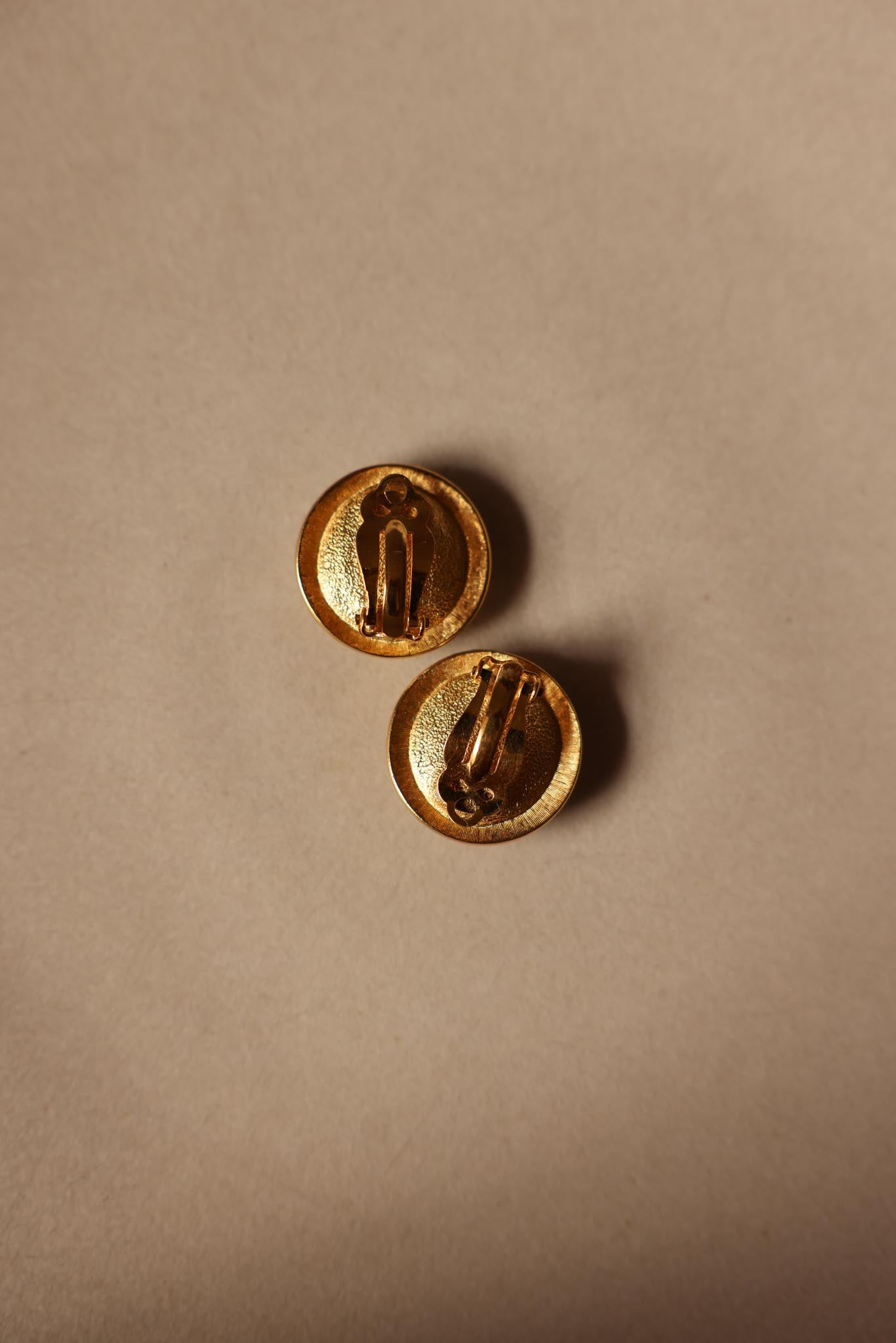 Gold-Tone Clip-On Earrings with Black Centers and Rhinestone Accents