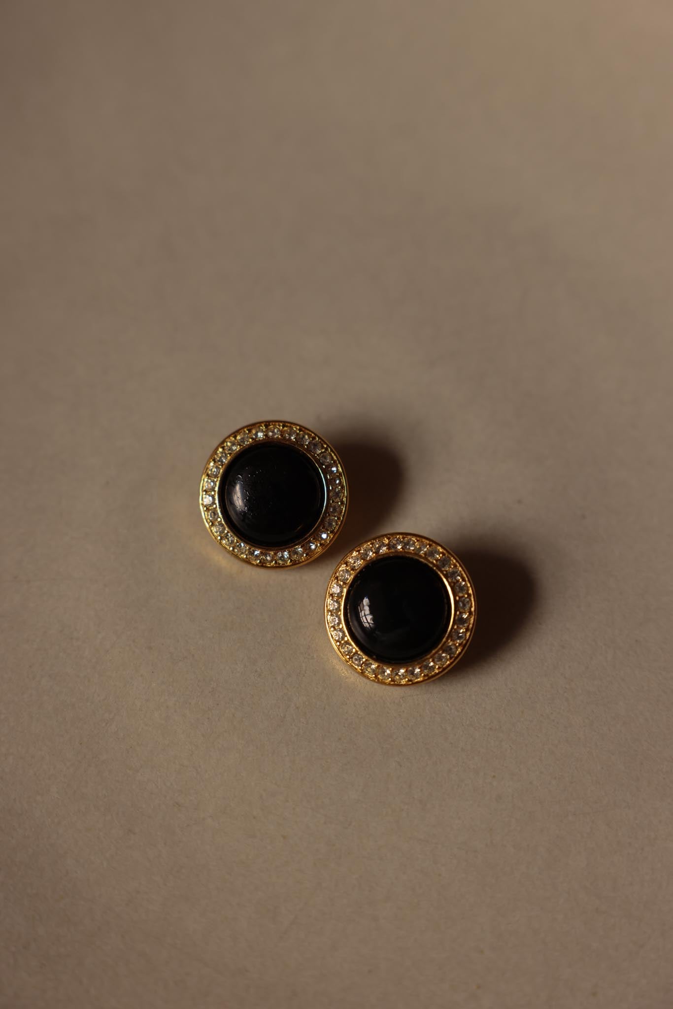 Gold-Tone Clip-On Earrings with Black Centers and Rhinestone Accents