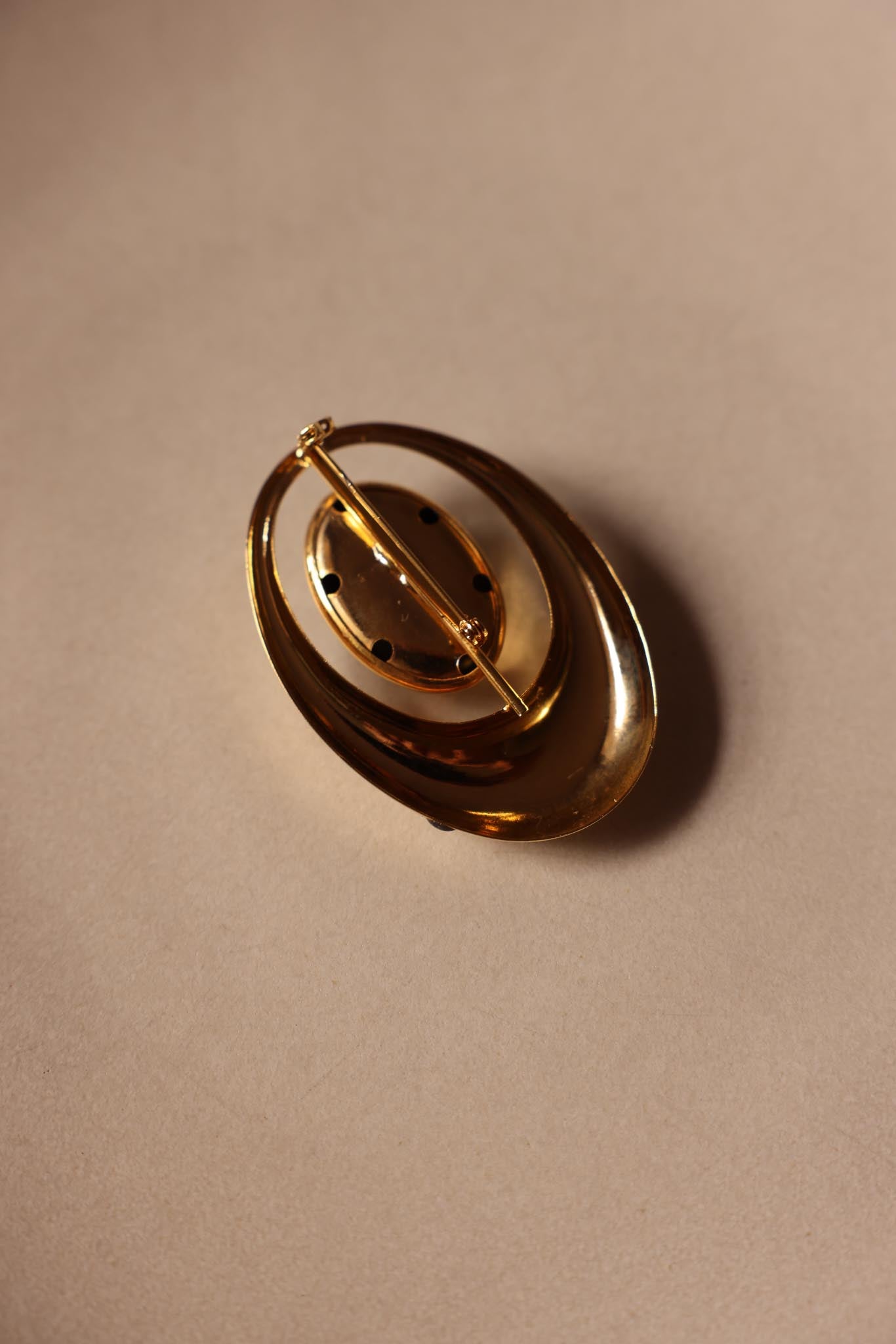 Two-Tone Oval Brooch with High-Polish Finish