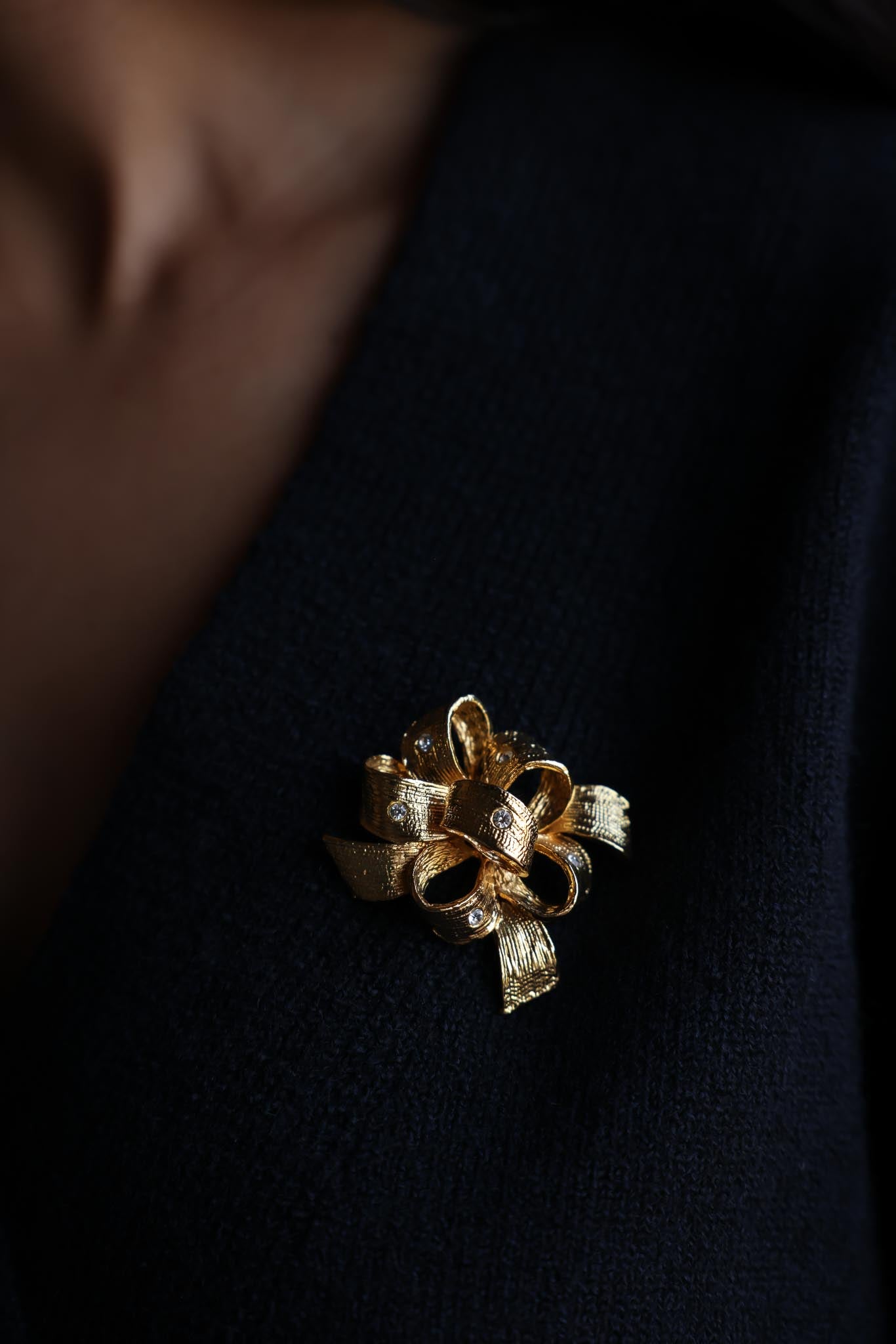 Gold Bow Brooch with Clear Rhinestones