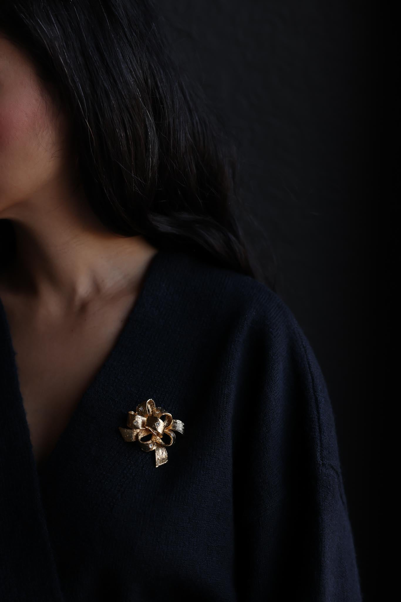 Gold Bow Brooch with Clear Rhinestones