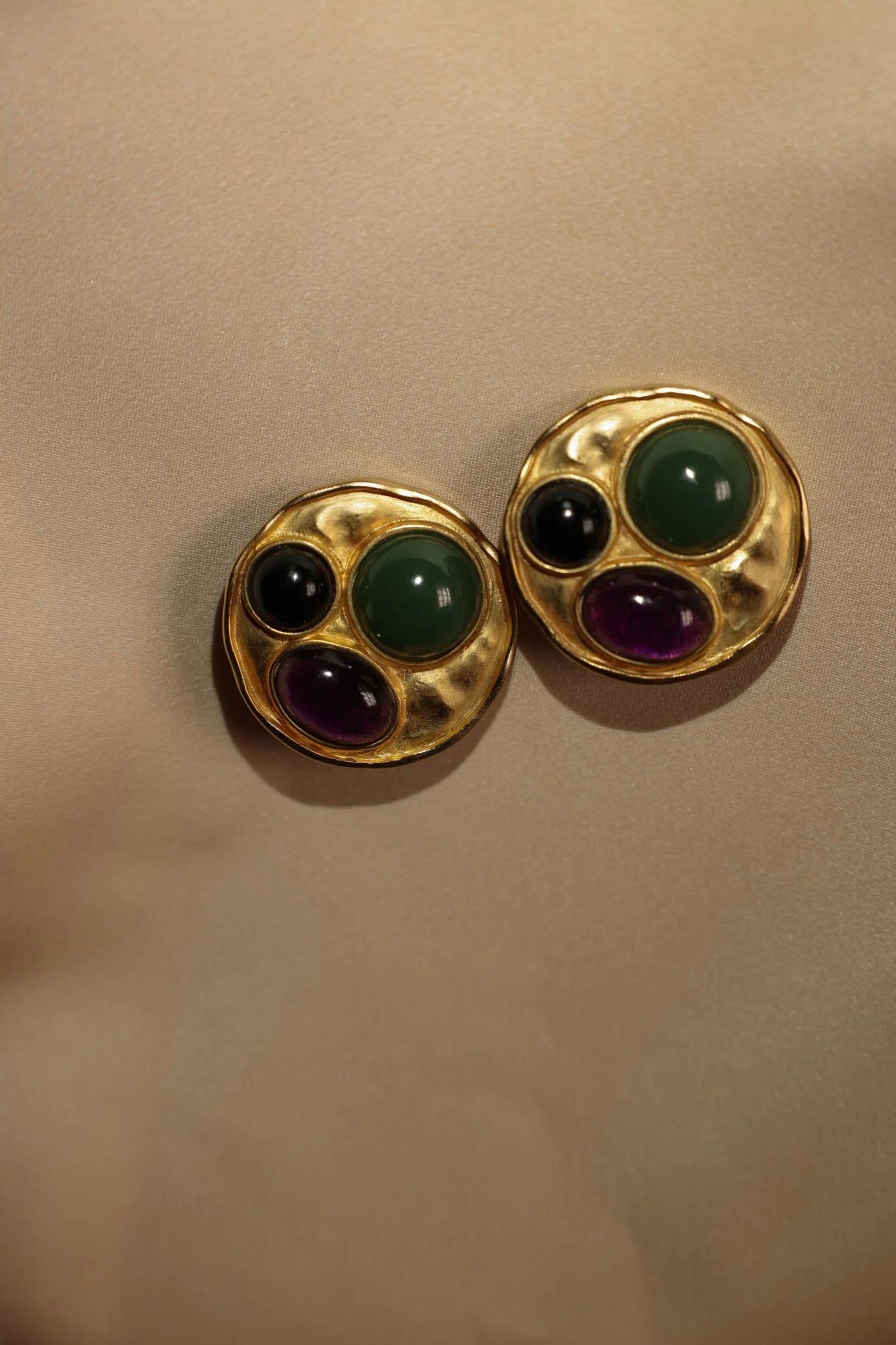 Matte Gold Disc Clip-On Earrings with Green, Purple, and Black Glass Cabochons