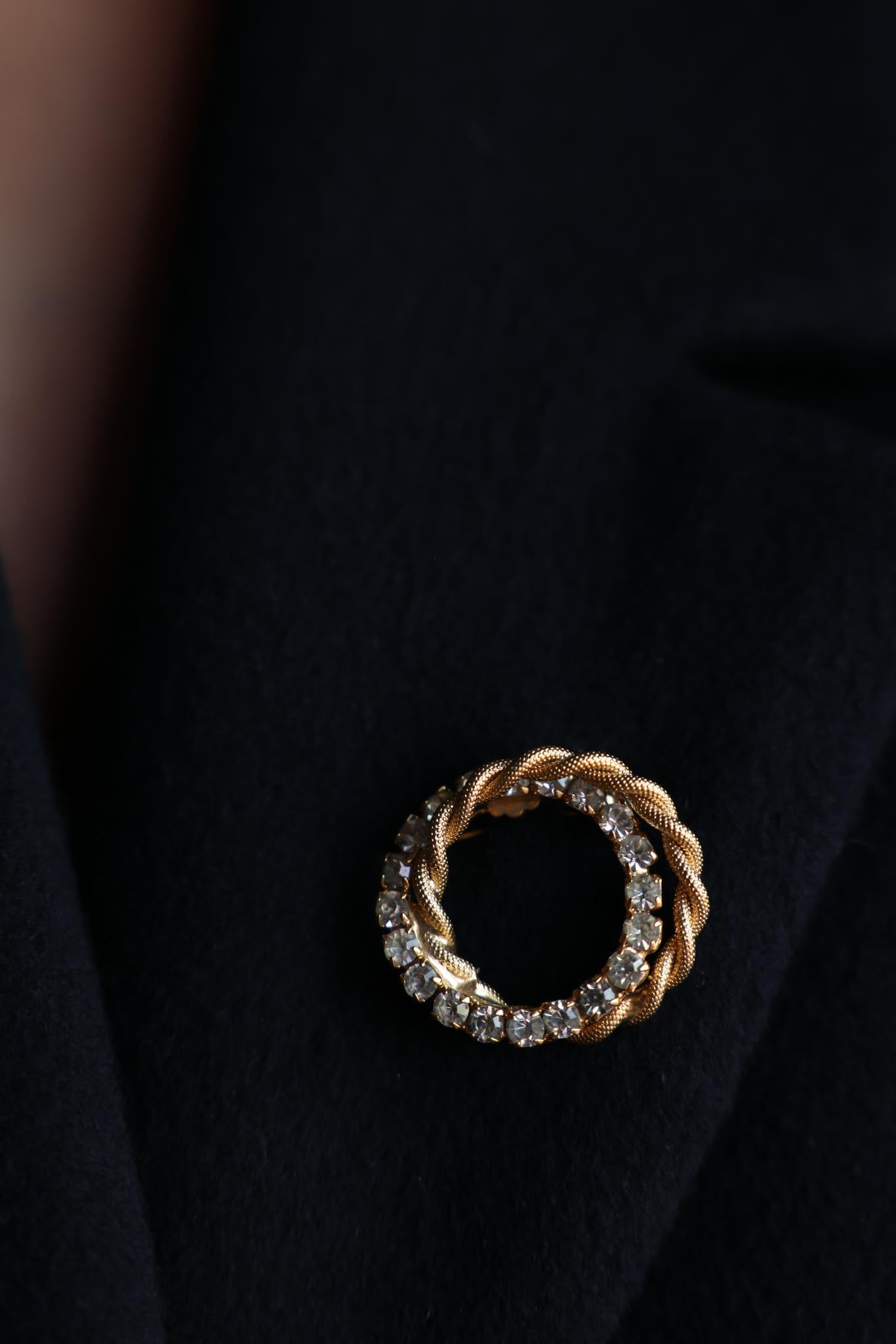 Gold-Tone Braided Circle Brooch with Clear Rhinestones