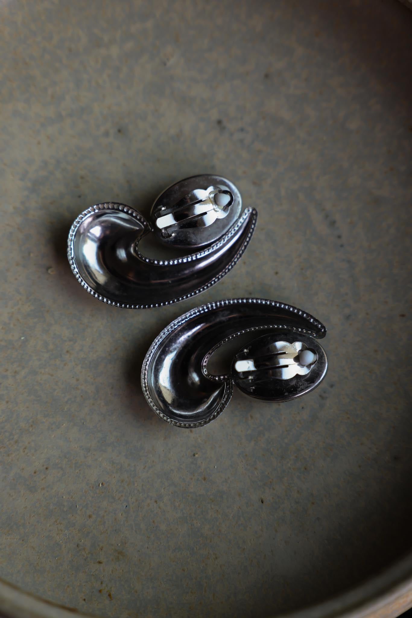 Silver Swirl Clip-On Earrings with Black Cabochons