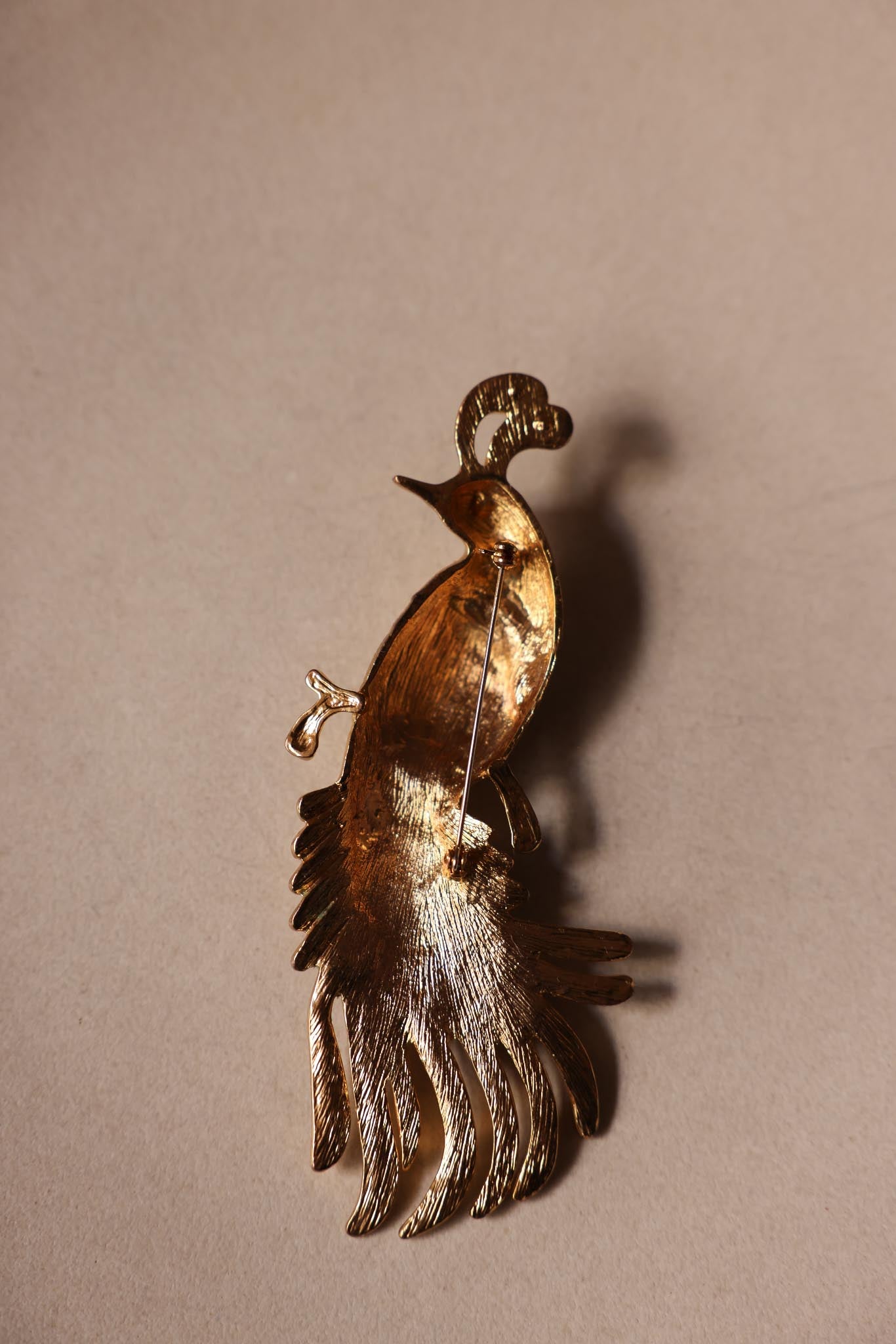 Gold-Tone Peacock Brooch with Rhinestone Accents