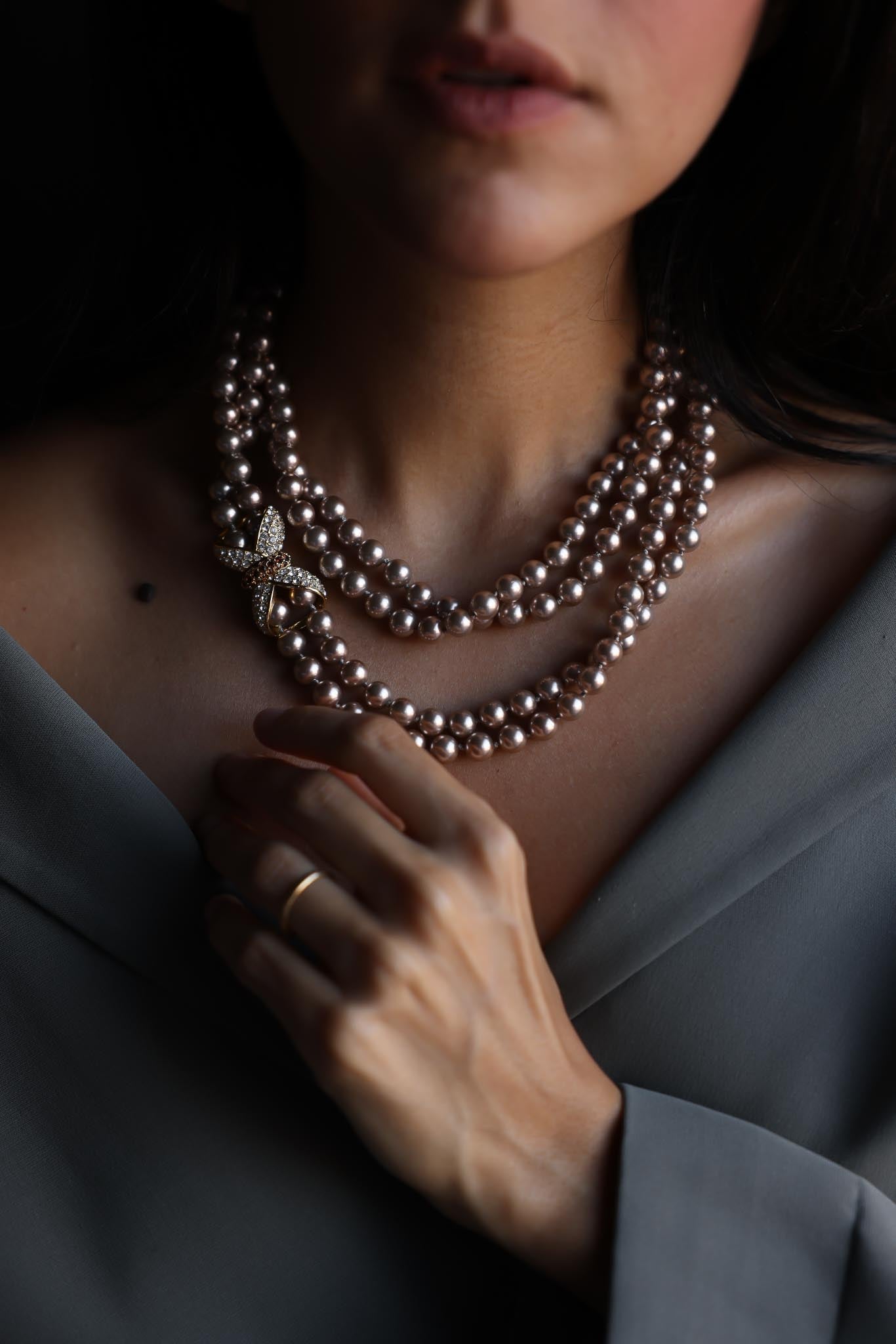 Nolan Miller Double Strand Faux Pearl Necklace with Rhinestone Bow Clasp|Vintage Baazaar 