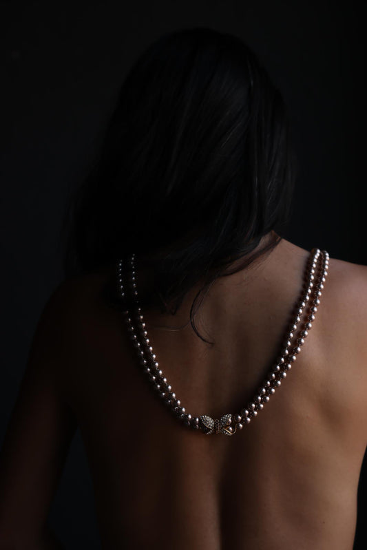 Nolan Miller Double Strand Faux Pearl Necklace with Rhinestone Bow Clasp|Vintage Baazaar 