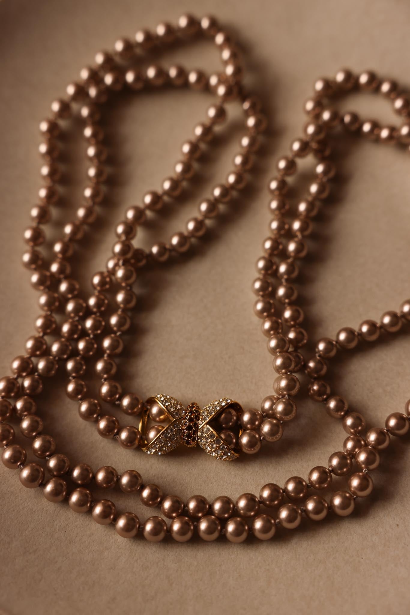 Nolan Miller Double Strand Faux Pearl Necklace with Rhinestone Bow Clasp|Vintage Baazaar 