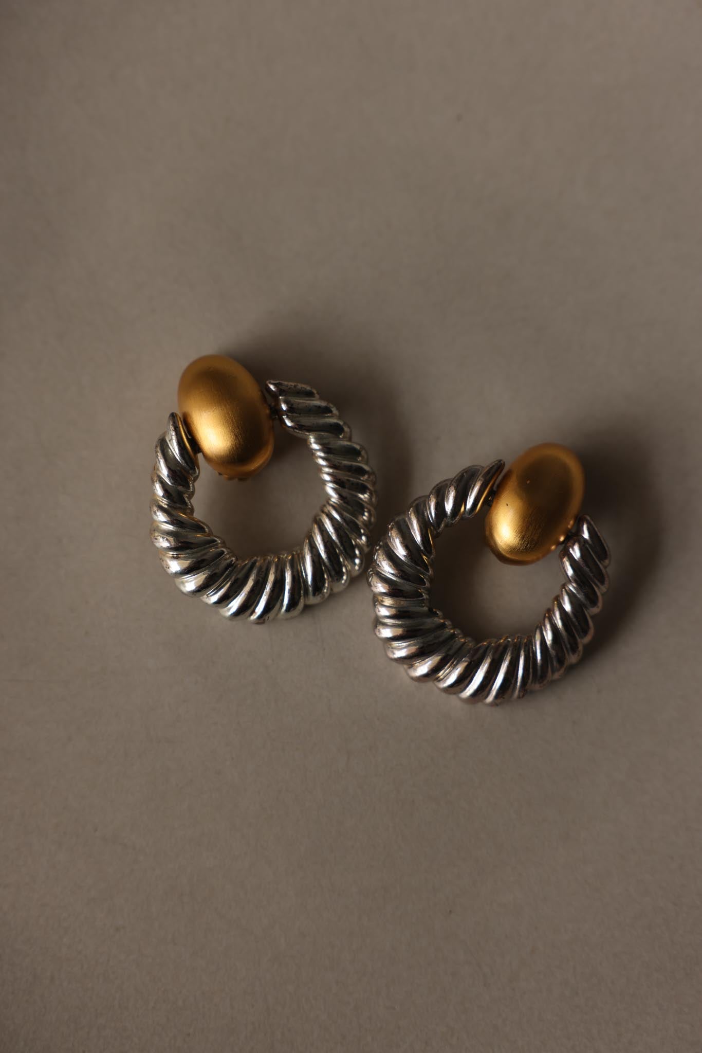 Two-Tone Twisted Hoop Clip-On Statement Earrings