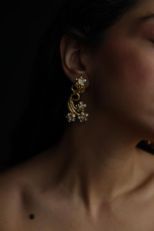 Matte Gold Rhinestone Swirl Clip-On Earrings