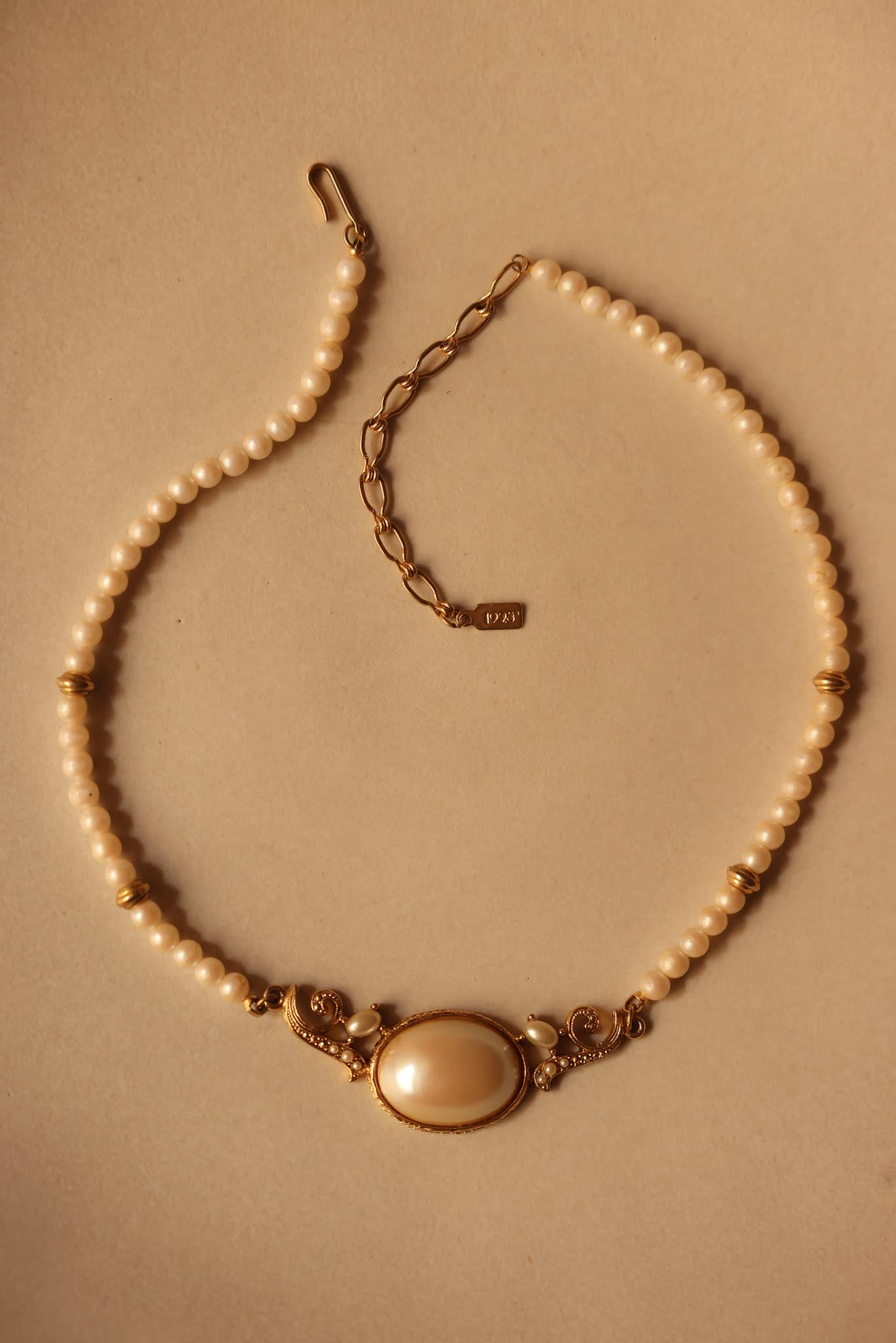 Signed 1928 Faux Pearl Necklace with Ornate Gold-Tone Centerpiece|Vintage Baazaar 
