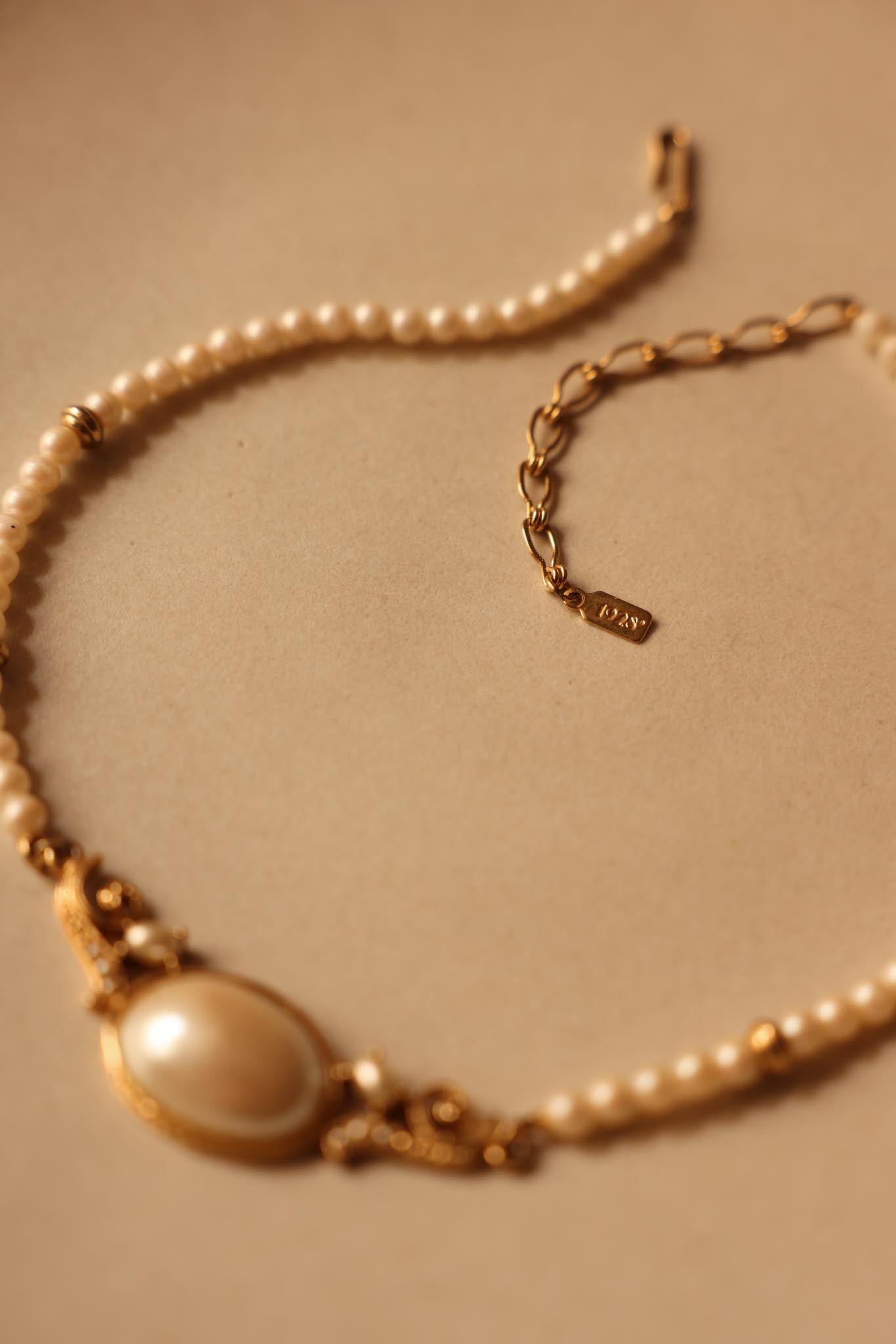 Signed 1928 Faux Pearl Necklace with Ornate Gold-Tone Centerpiece|Vintage Baazaar 