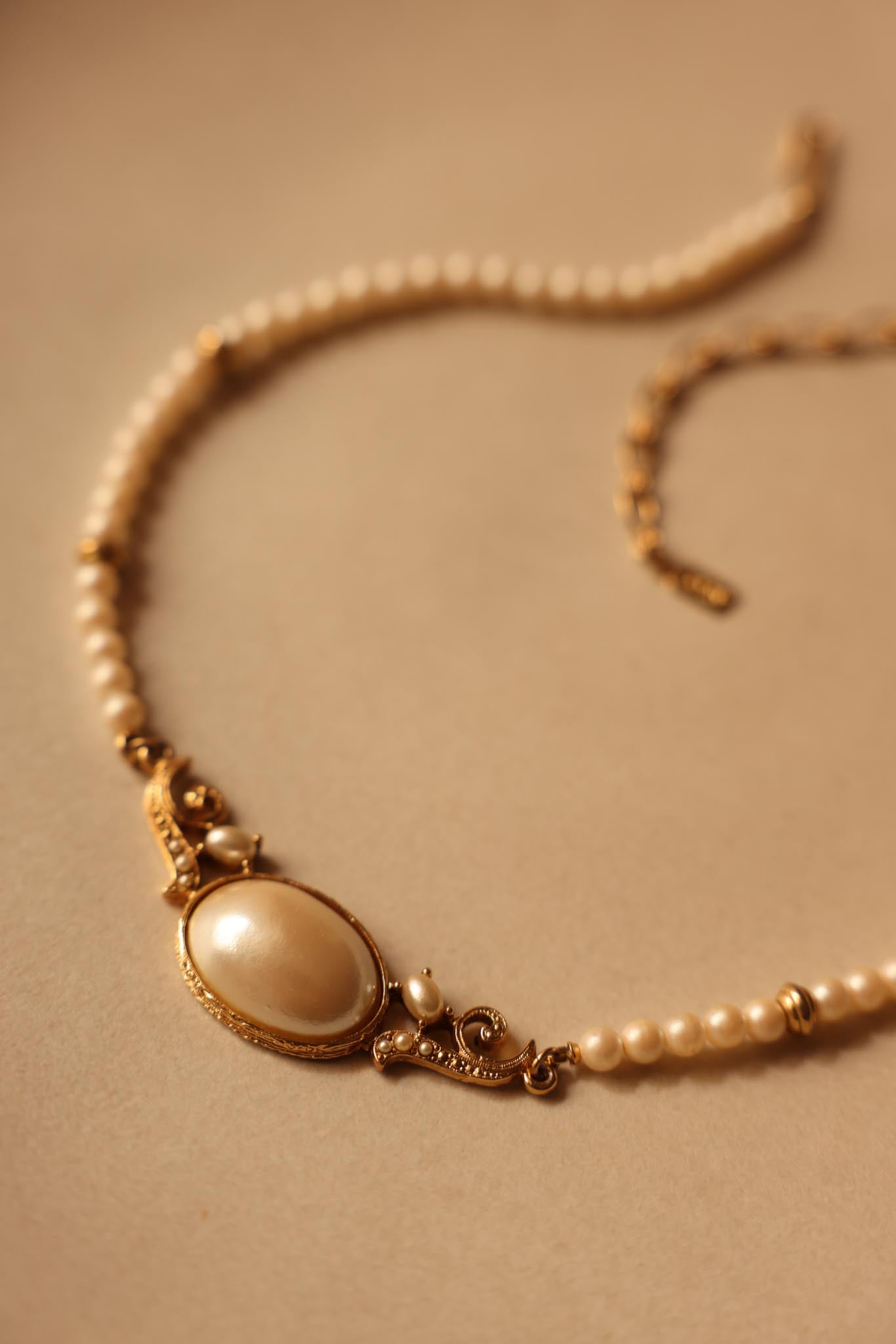 Signed 1928 Faux Pearl Necklace with Ornate Gold-Tone Centerpiece|Vintage Baazaar 