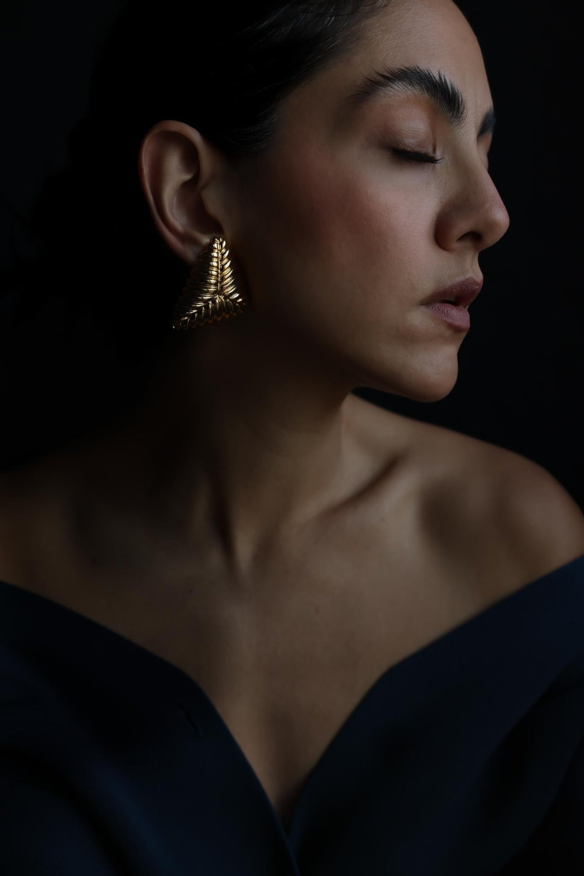 Gold Tone Ribbed Triangle Statement Clip-On Earrings