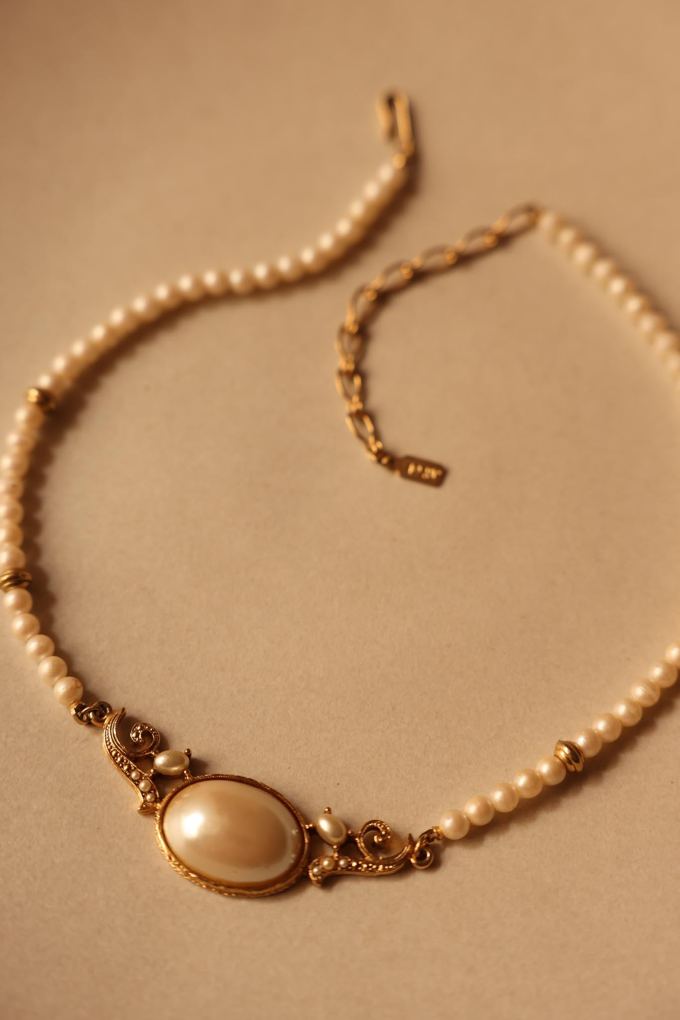 Signed 1928 Faux Pearl Necklace with Ornate Gold-Tone Centerpiece|Vintage Baazaar 