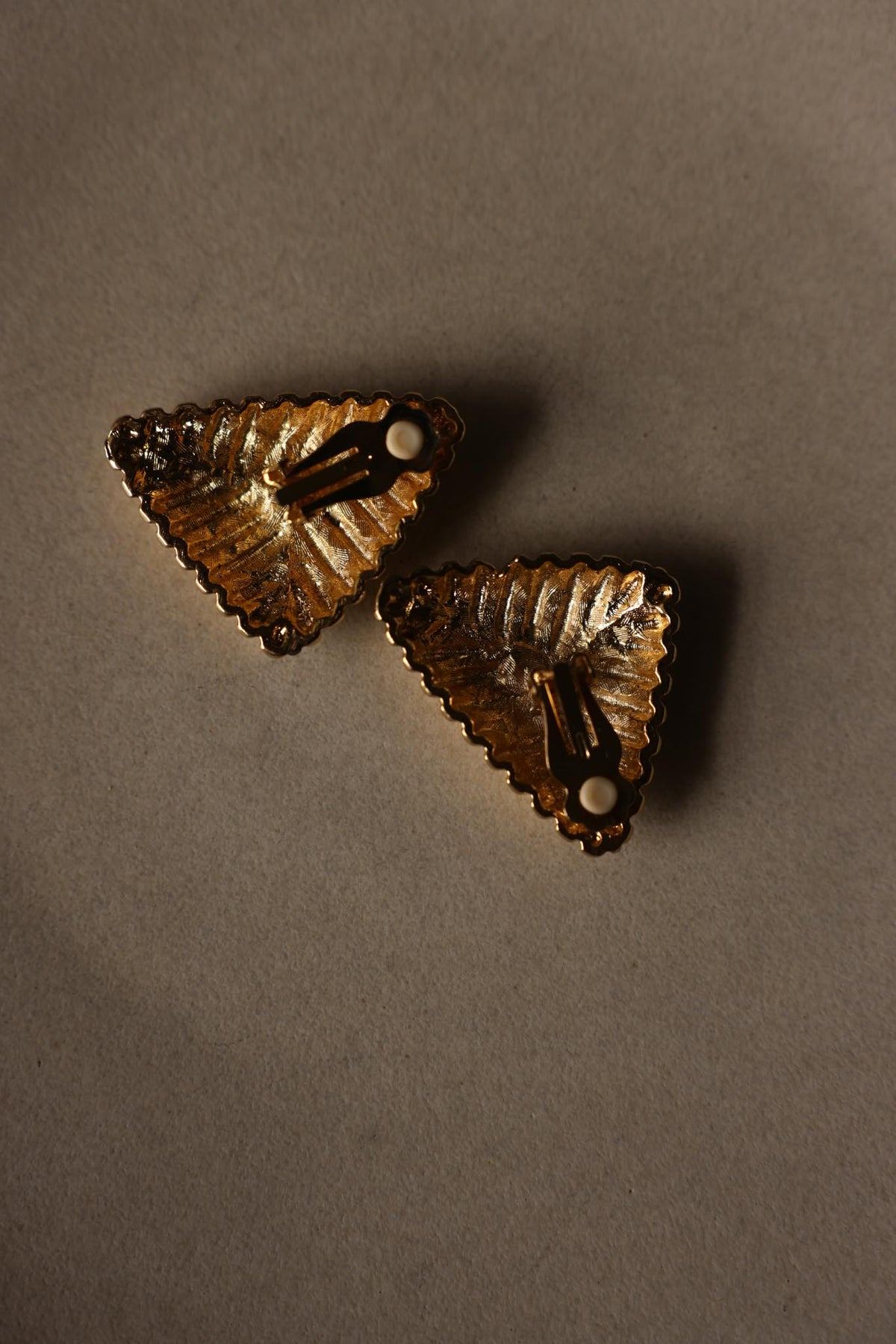 Gold Tone Ribbed Triangle Statement Clip-On Earrings