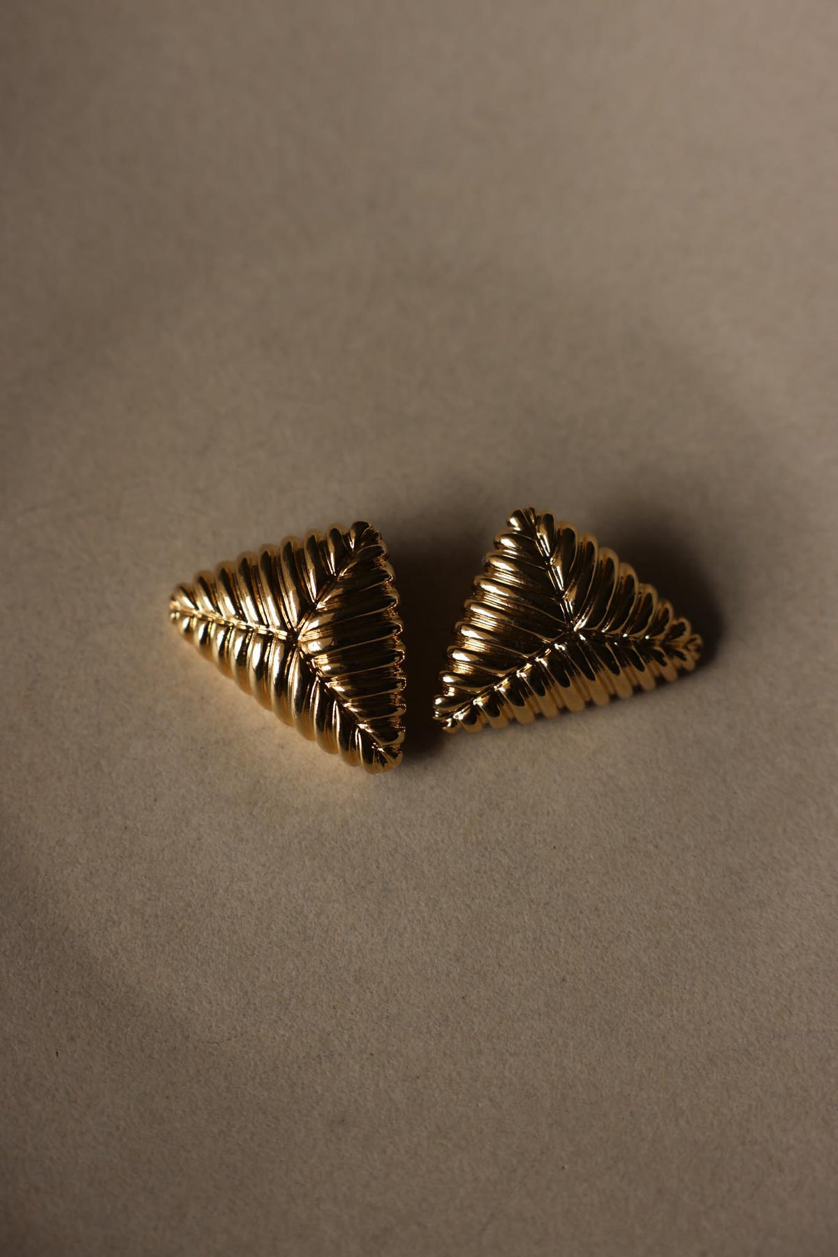 Gold Tone Ribbed Triangle Statement Clip-On Earrings