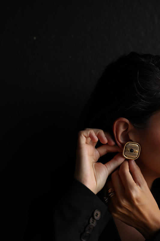Trifari Matte Gold Clip-On Earrings with Black Center