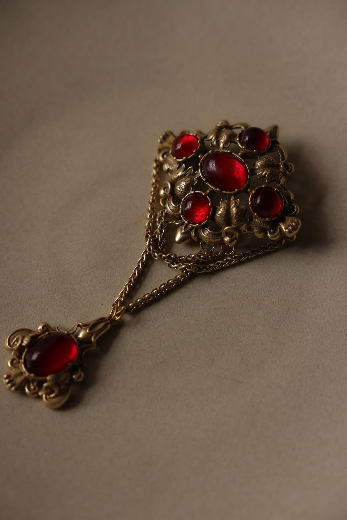 Trifari Gold Tone Red Cabochon Ornate Dangle Brooch|Vintage Baazaar 