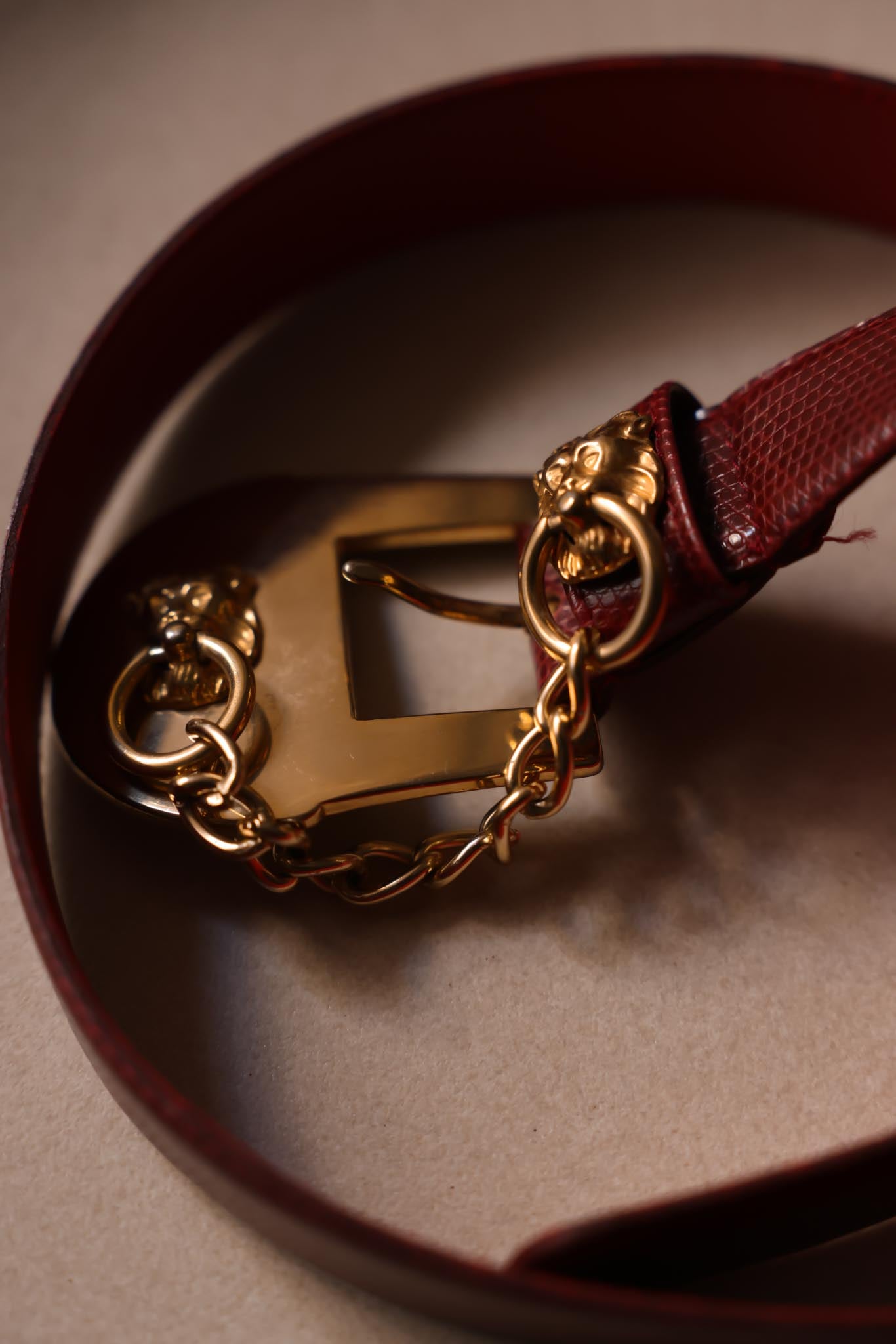 1980s Milor Burgundy Leather Lion Head Chain Belt