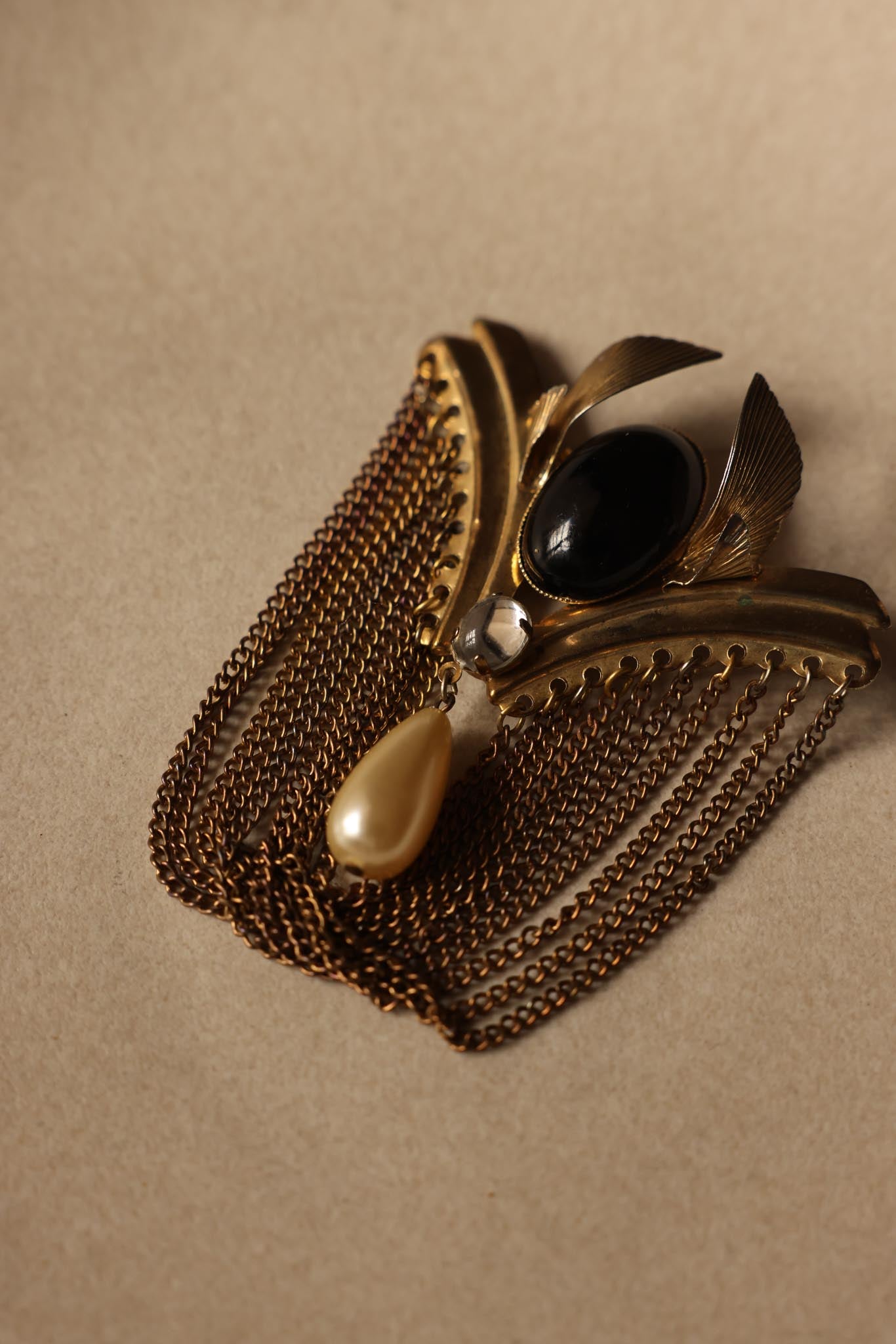 Art Deco Revival Gold-Toned Brooch with Chains and Faux Pearl Drop|Vintage Baazaar 