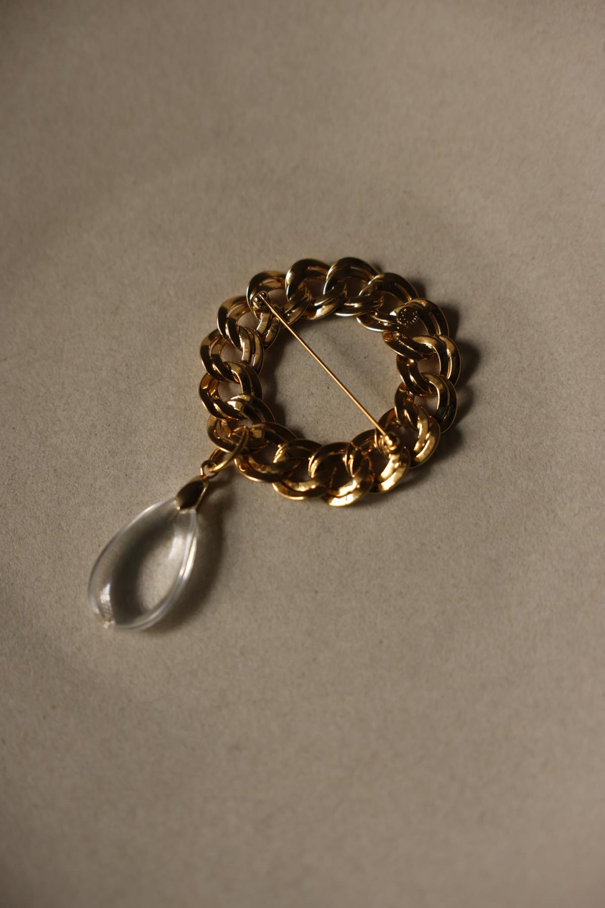 Gold Tone Chunky Chain Link Brooch with Clear Teardrop Dangle
