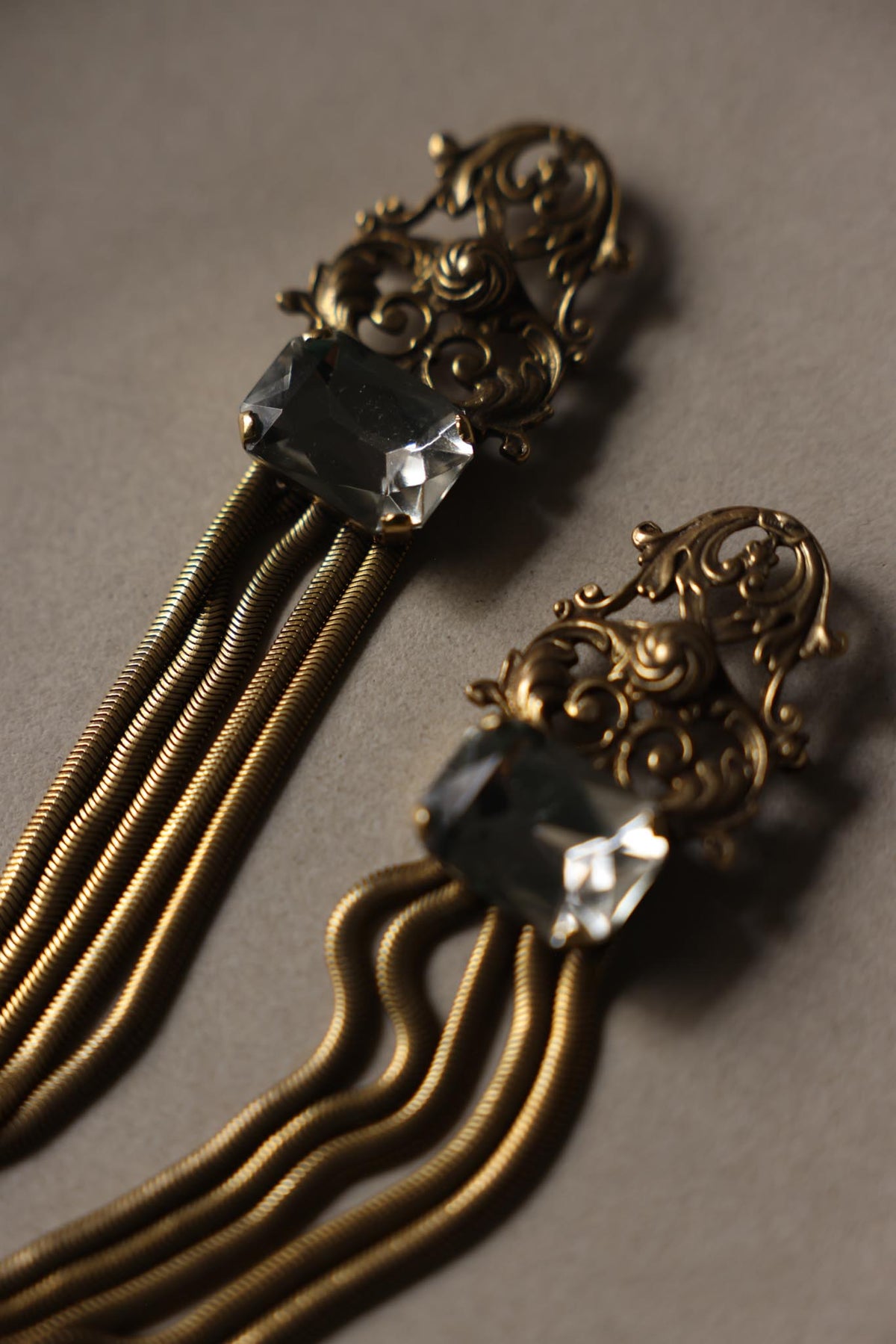 Antiqued Gold Tone Rhinestone Sweater Chain Brooch