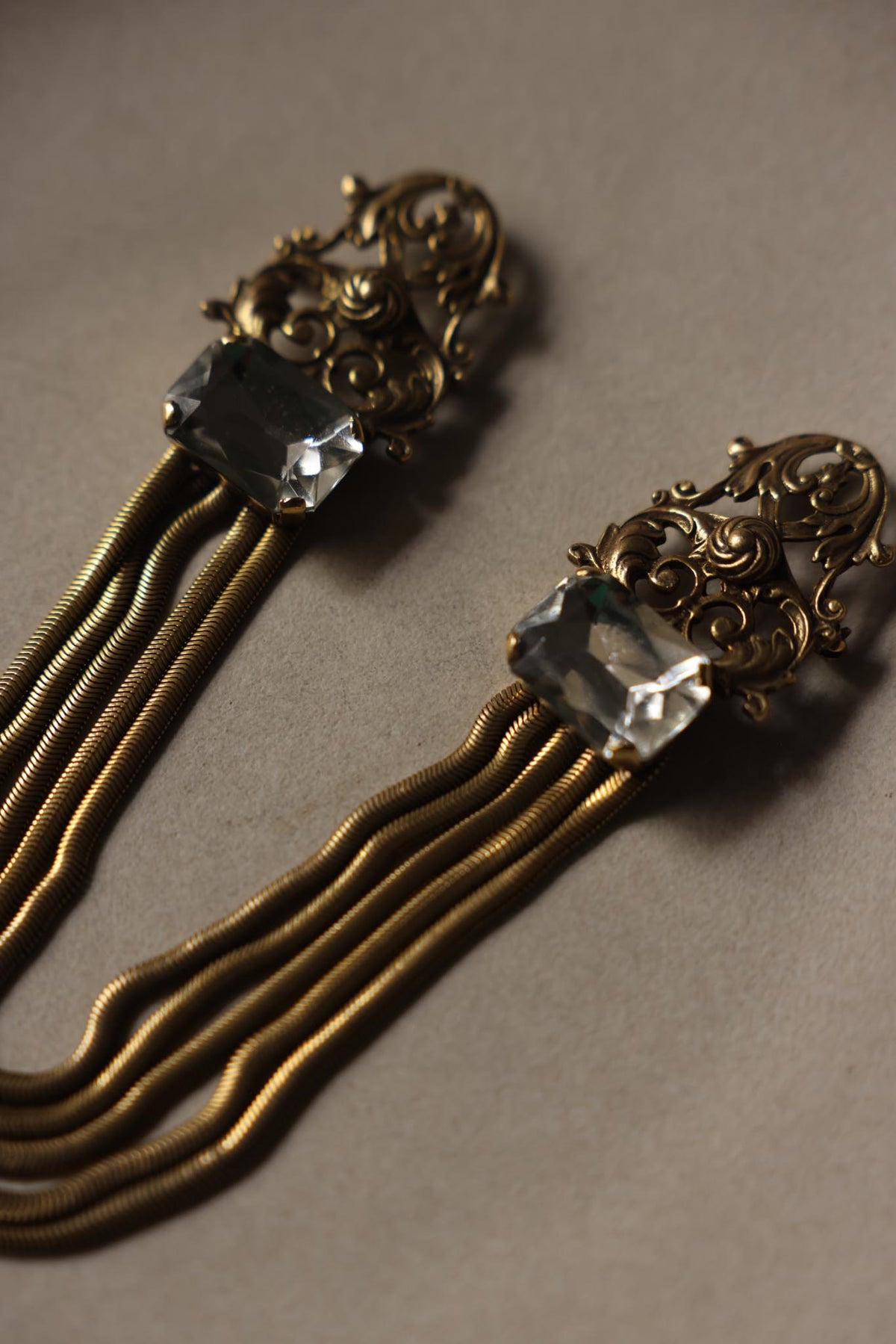 Antiqued Gold Tone Rhinestone Sweater Chain Brooch