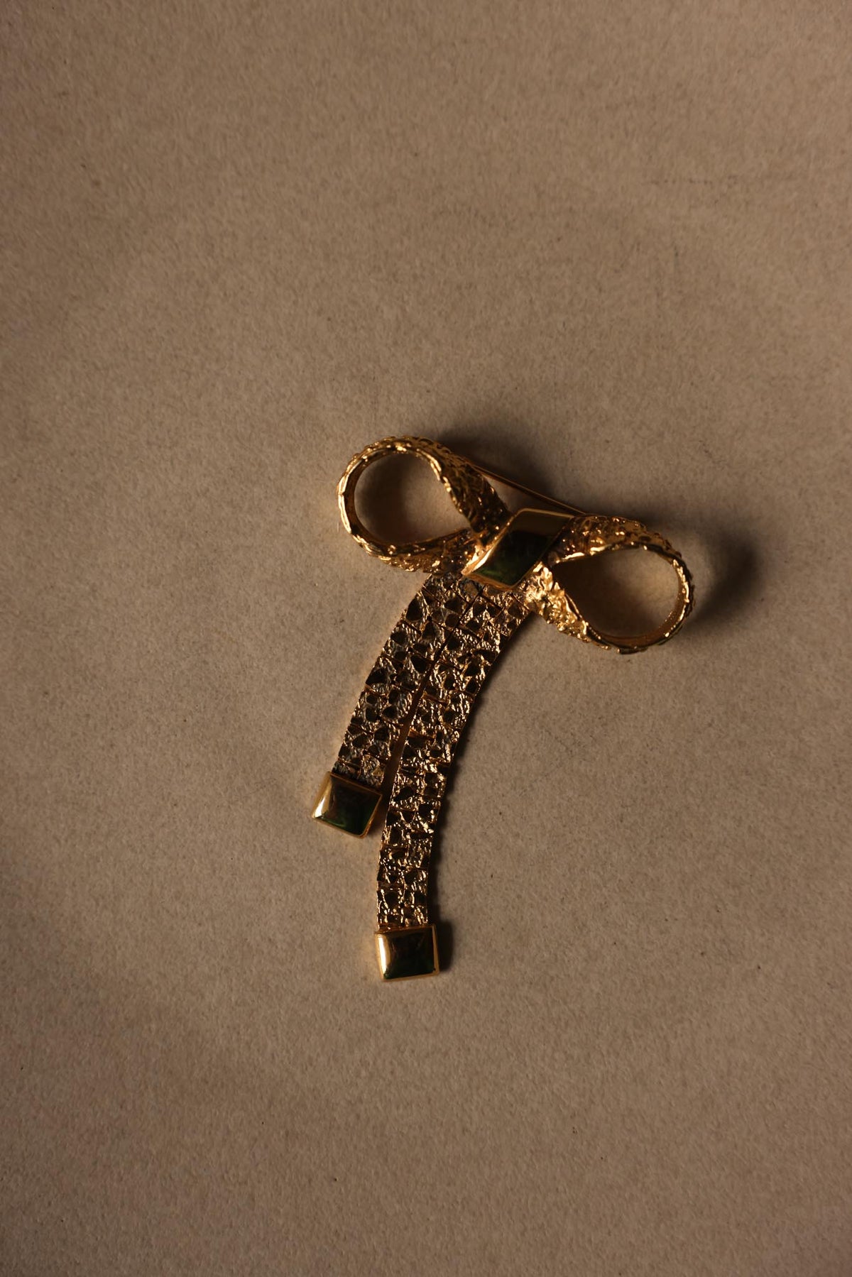 Gold Tone Textured Bow Brooch