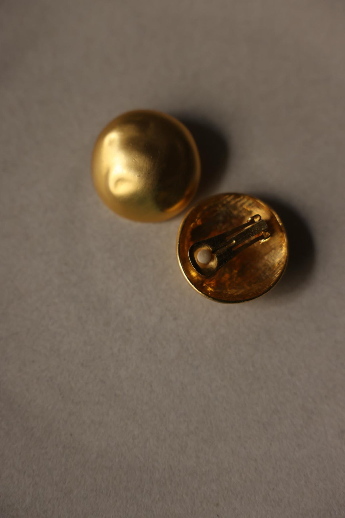 Matte Gold Tone Domed Disc Clip-On Earrings