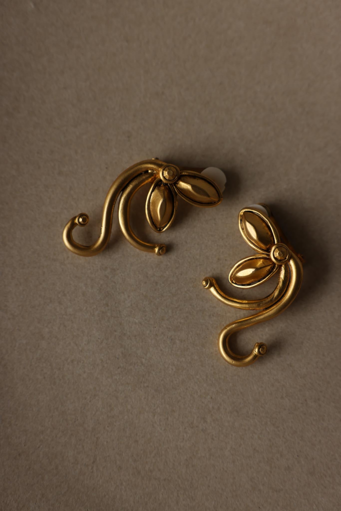 Gold Tone Swirl Statement Clip-On Earrings
