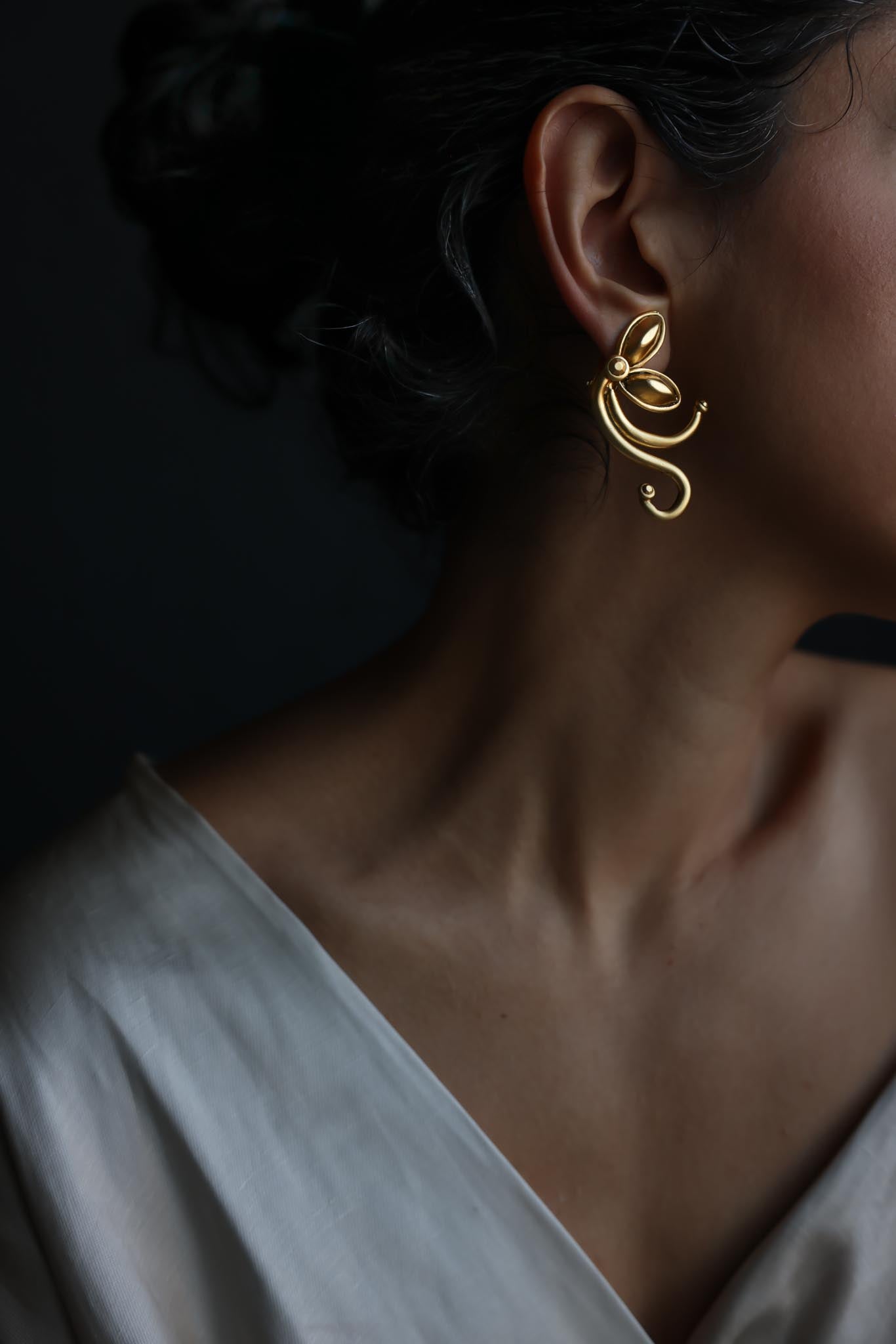 Gold Tone Swirl Statement Clip-On Earrings