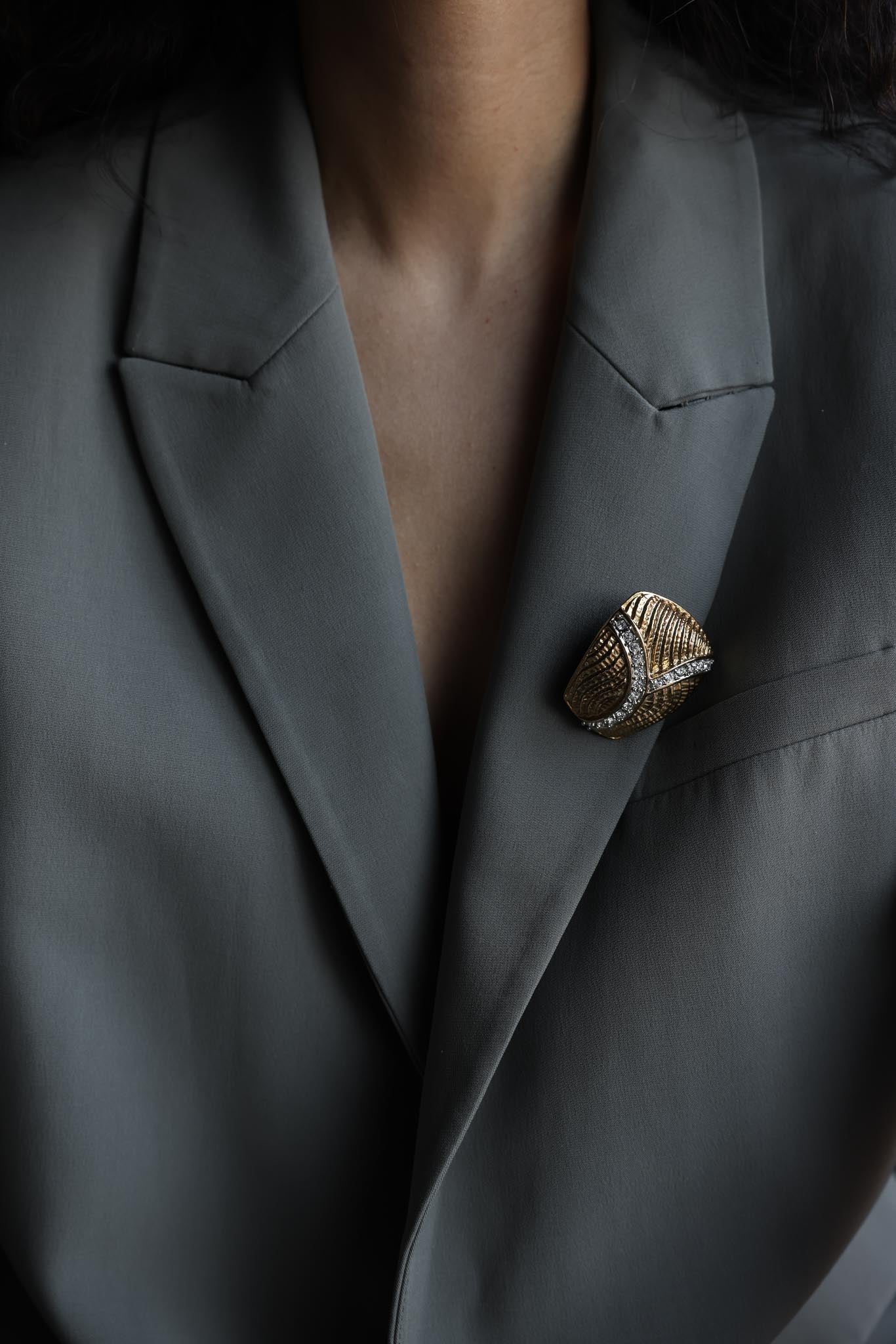 Gold-Toned Textured Brooch with Rhinestone Accents