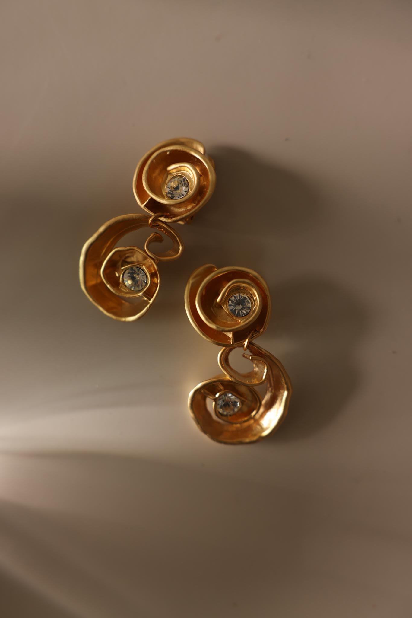 Matte Gold Spiral Rhinestone Drop Clip-On Earrings