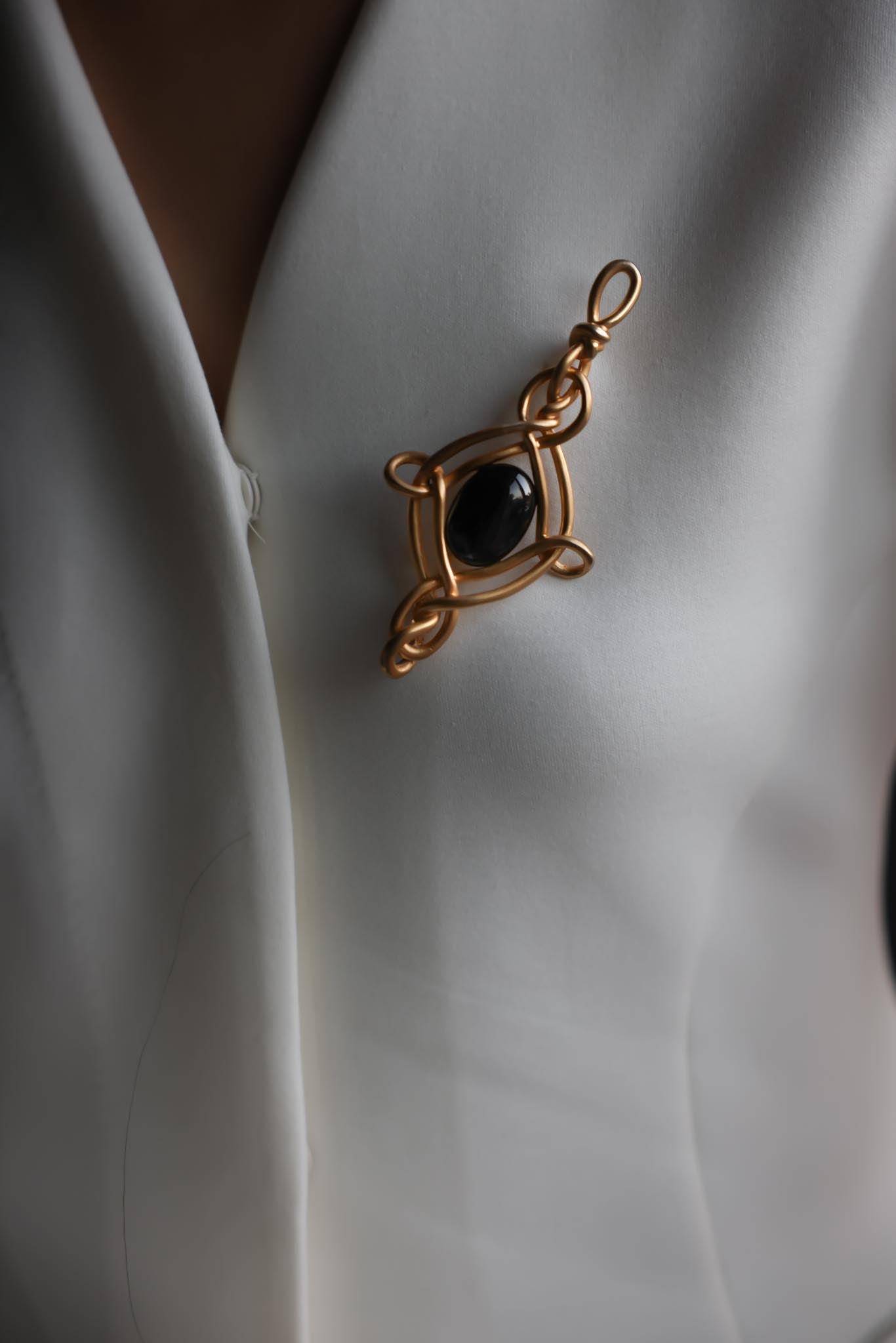Gold-Plated Brooch with Black Glass Center