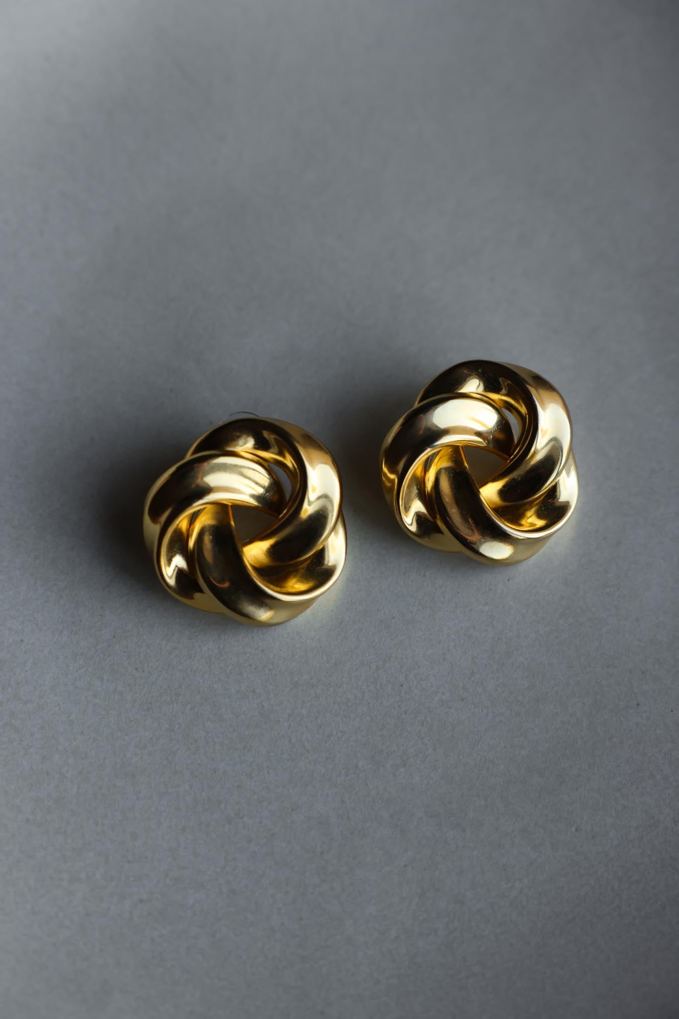 Swirled Gold-Tone Knot Pierced Earrings|Vintage Baazaar 