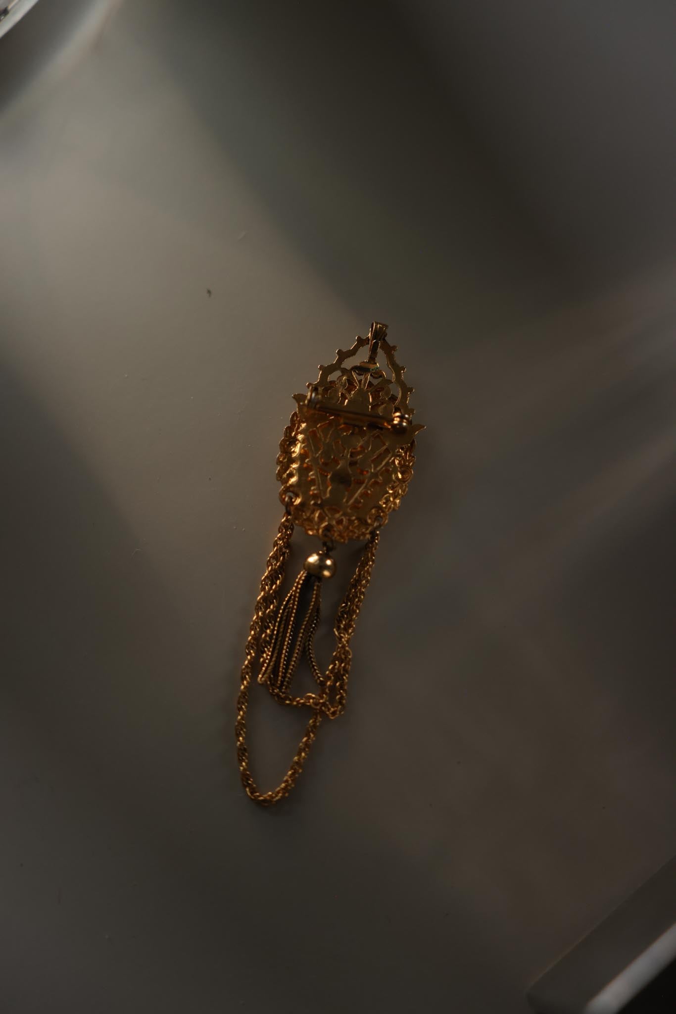 Gold Tone White Glass Pendant Brooch with Chain Tassel