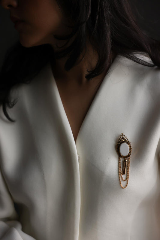 Gold Tone White Glass Pendant Brooch with Chain Tassel